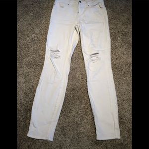 White jeans with holes